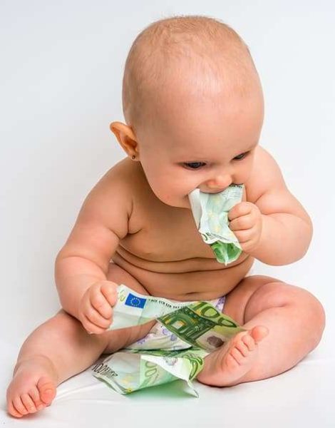 Adorable baby with euro bills money isolated on white background
