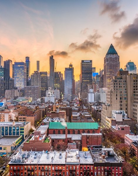 New York, New York, USA midtown Manhattan skyline over Hell's Kitchen at dawn.